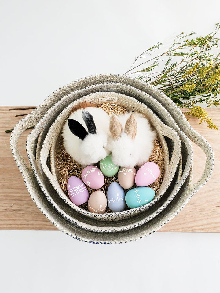 Handcrafted jute fruit bowl, off-white with black stitch accents