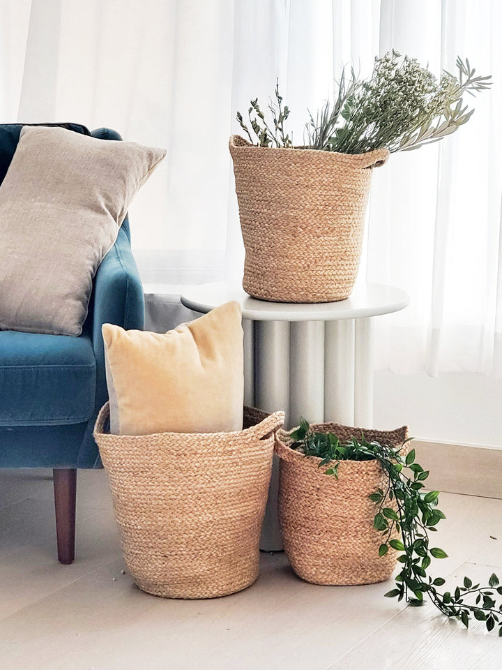 Streamlined jute storage basket with slit handles for books or magazines