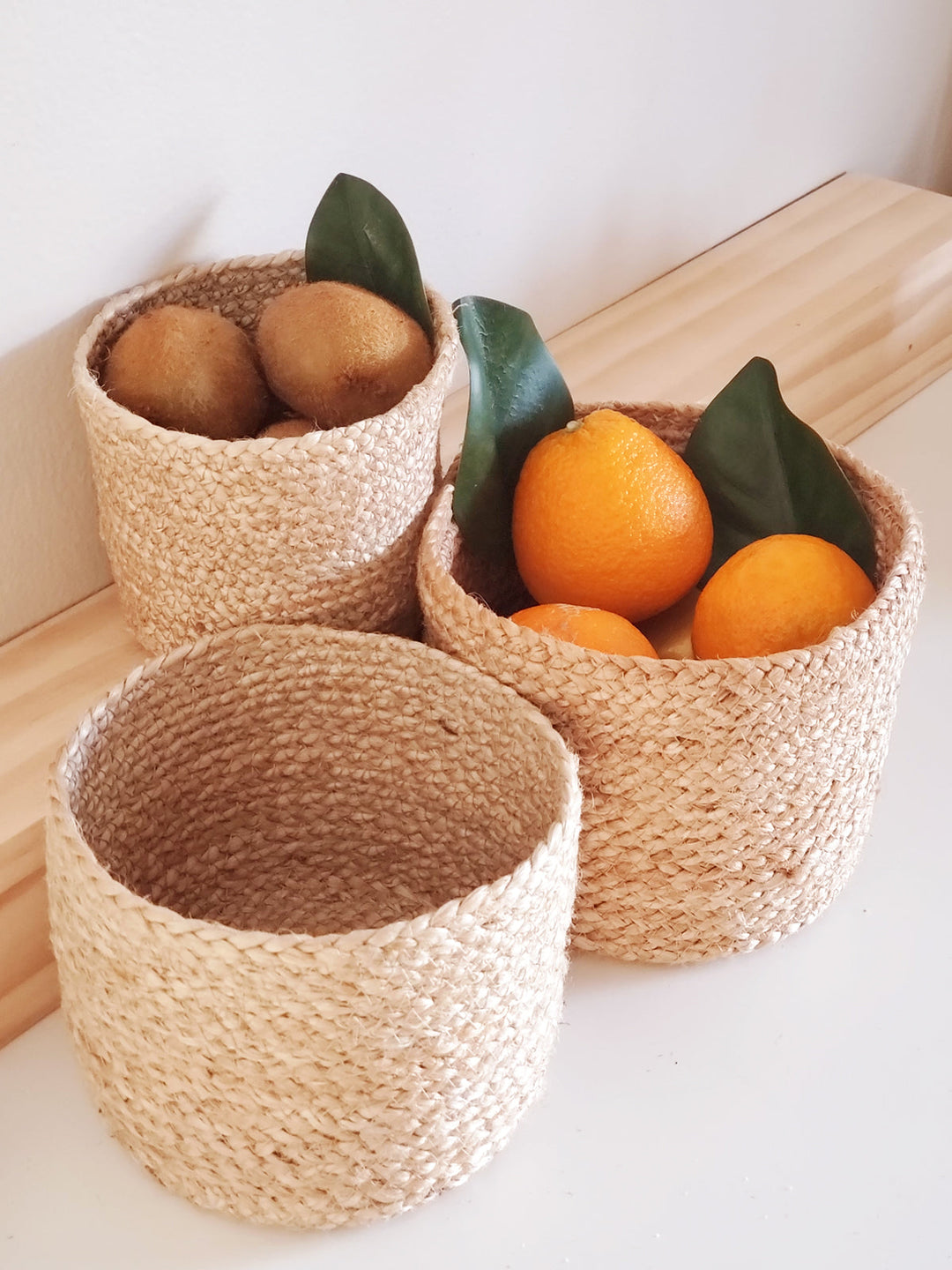 Round handwoven jute basket, natural color, perfect for everyday organizing
