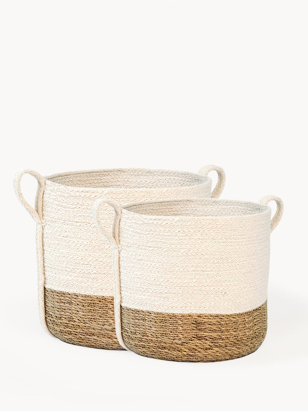Small natural fiber storage basket with side handle by DC-KORISSA, ideal for organization and decorative storage.