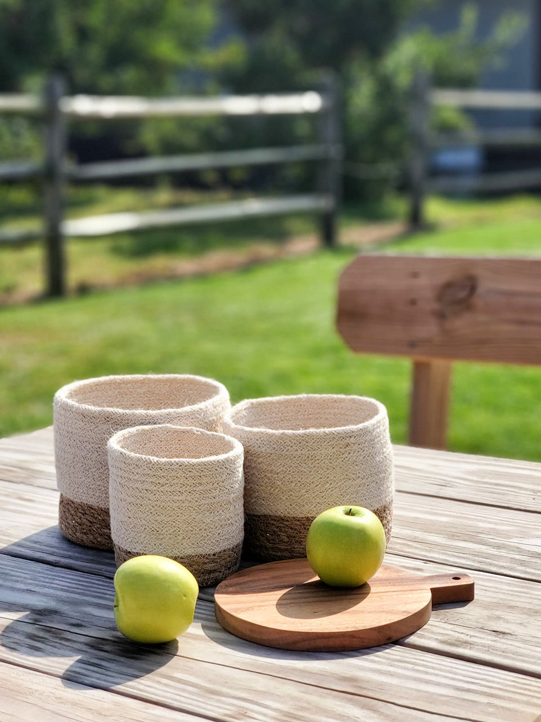 Natural seagrass round storage basket by DC-KORISSA, small size, with woven texture for stylish organization.