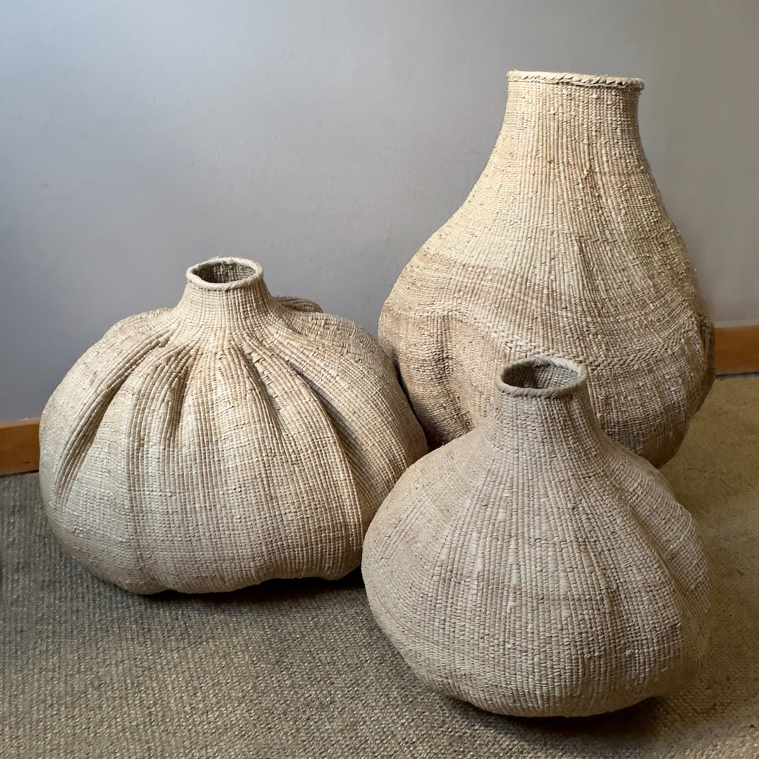 Garlic Tonga sculptural basket, organic flowing form handwoven by Ndebele artisans in Zimbabwe.