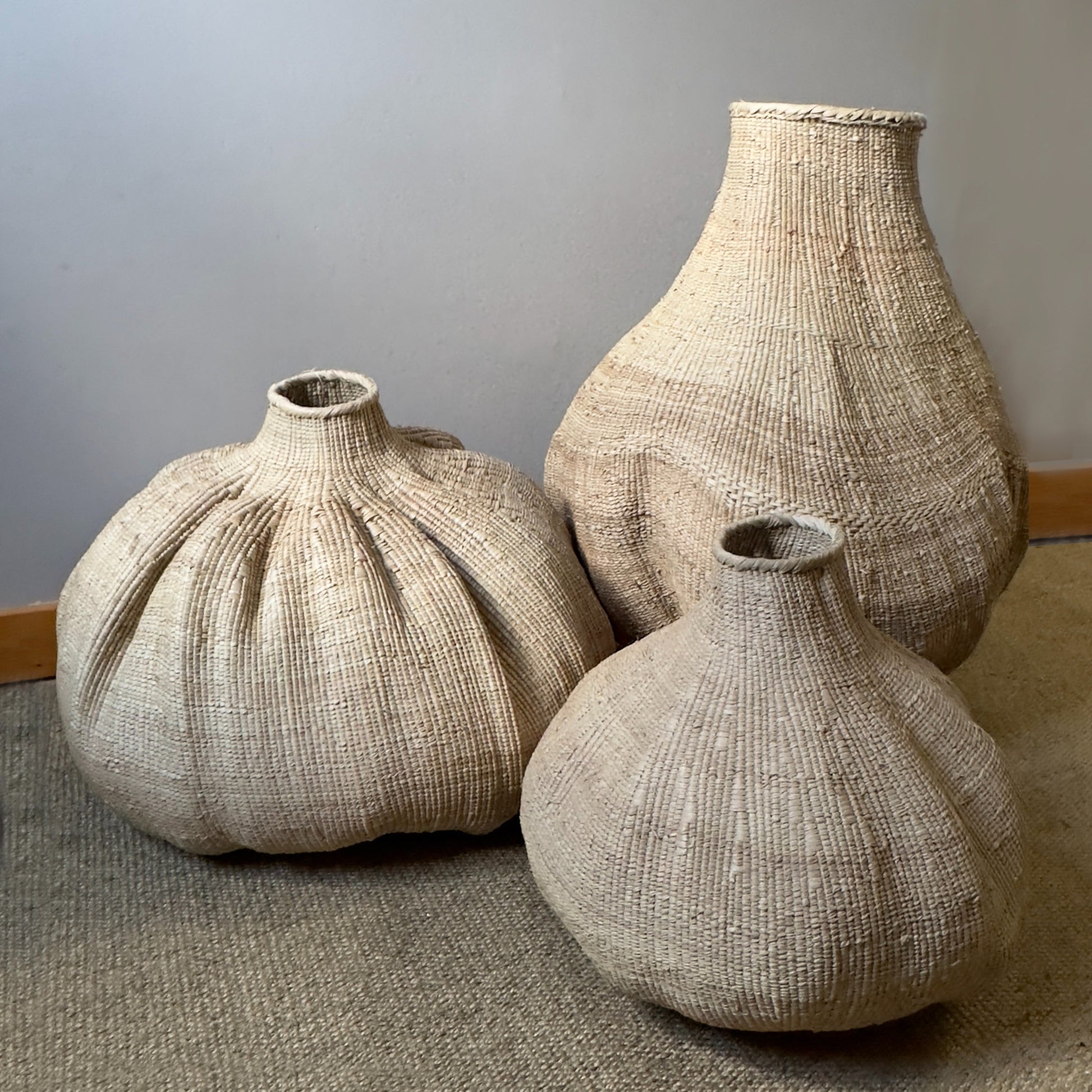 Ilala Palm Tonga Sculptural Garlic Basket by DC-Powered by People, featuring intricate woven design and natural material.