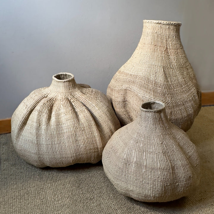 Garlic Tonga sculptural basket, organic flowing form handwoven by Ndebele artisans in Zimbabwe.