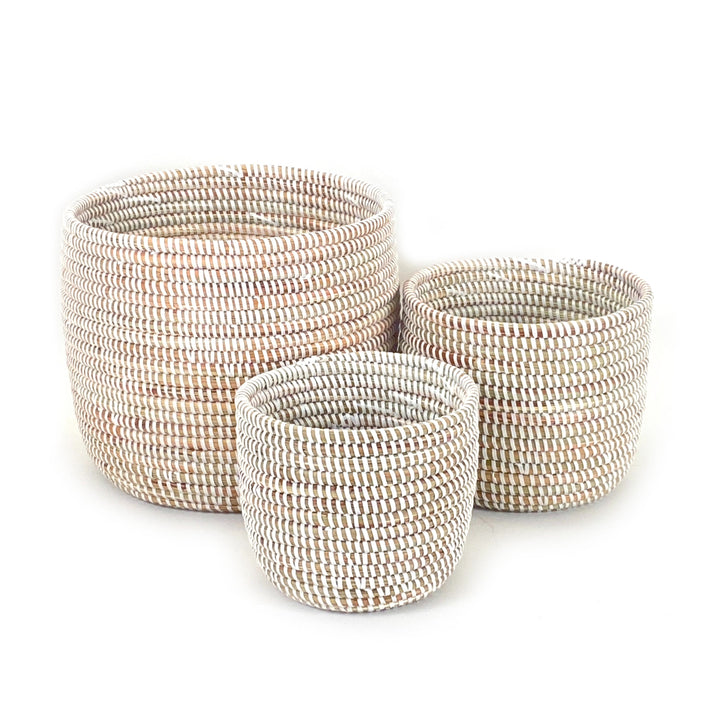 Small white planter basket with a sleek, minimalist woven design.