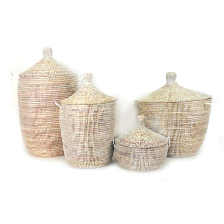 White woven storage basket with lid for organizing and decluttering.
