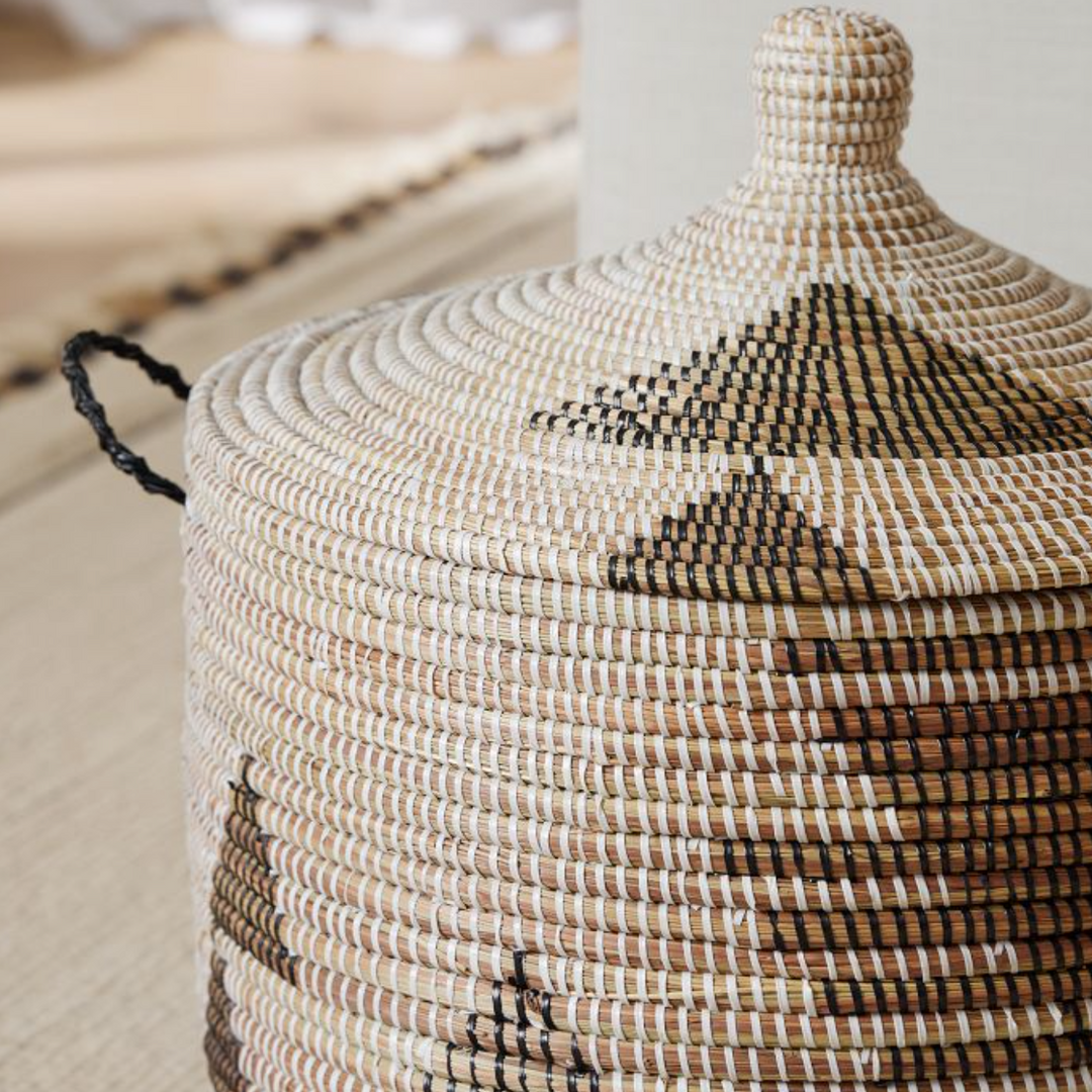 Black and white graphic print floor basket, handwoven for stylish storage.
