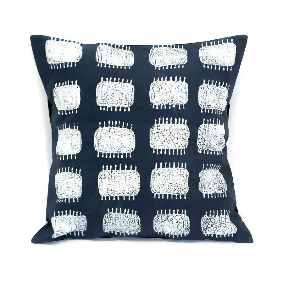 Ember shaggy throw pillow cover in a soft neutral tone with plush texture.