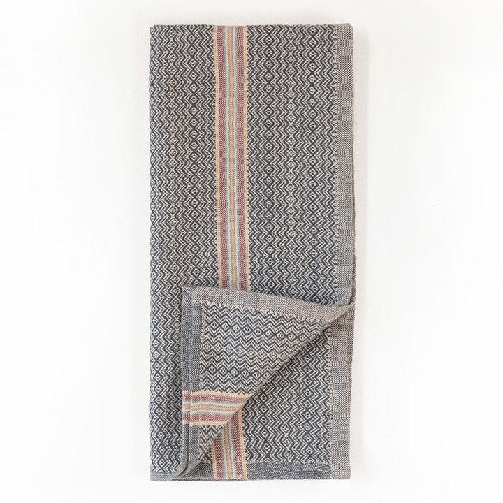 Set of four Mungo cotton dinner napkins in cardamom, handwoven from Southern African cotton.