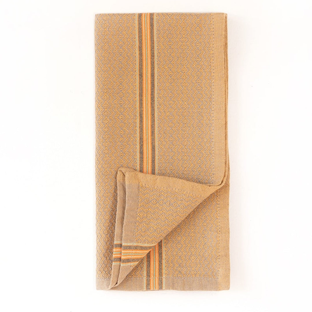 Multicolor cotton dinner napkins with cumin, ginger, mint, and truffle accents.