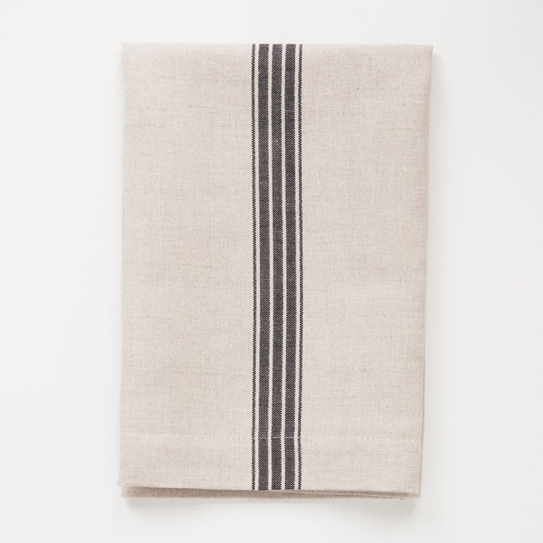 Set of four Mungo linen-cotton dinner napkins with a natural and French navy stripe.