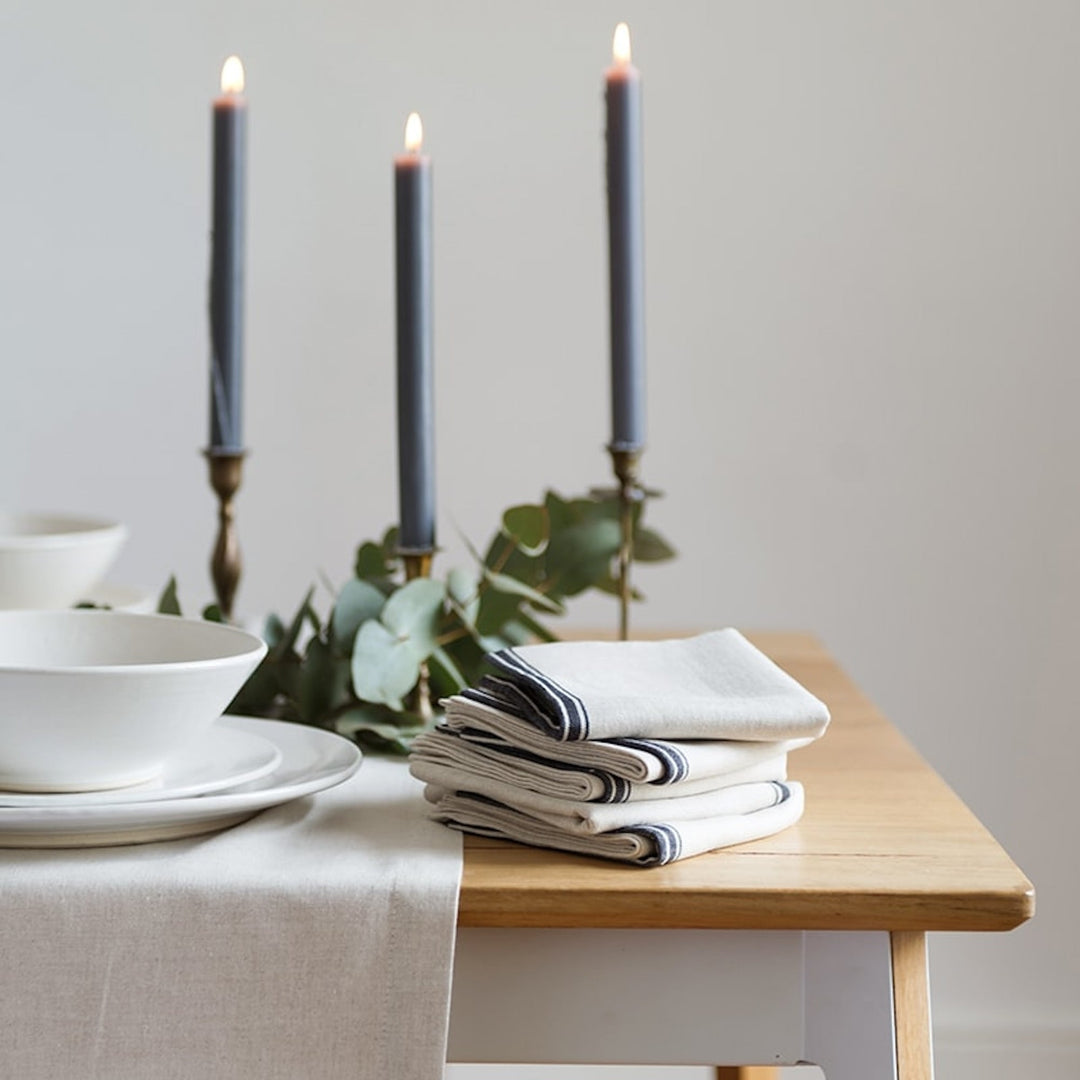 Set of four Mungo linen-cotton napkins in a natural and French navy stripe.