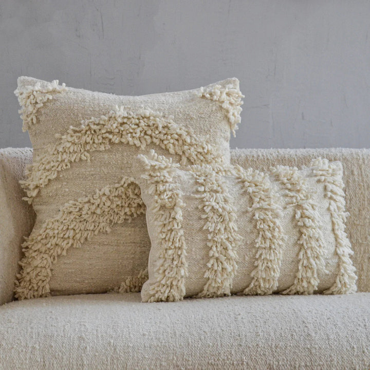 San Antonio pillow cover in hand-spun wool, showing its textured handwoven surface.
