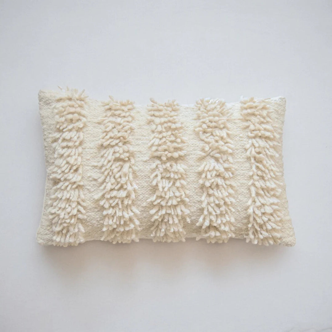 Detail of the hand-loomed wool San Antonio pillow cover and its natural color variation.