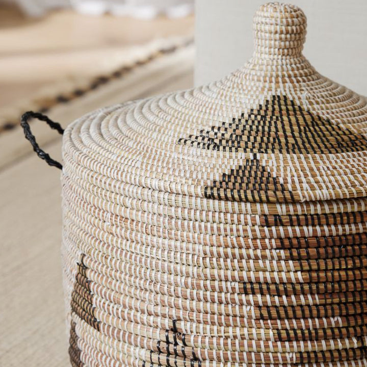 Black and white graphic print lidded hamper, handwoven millet grass.