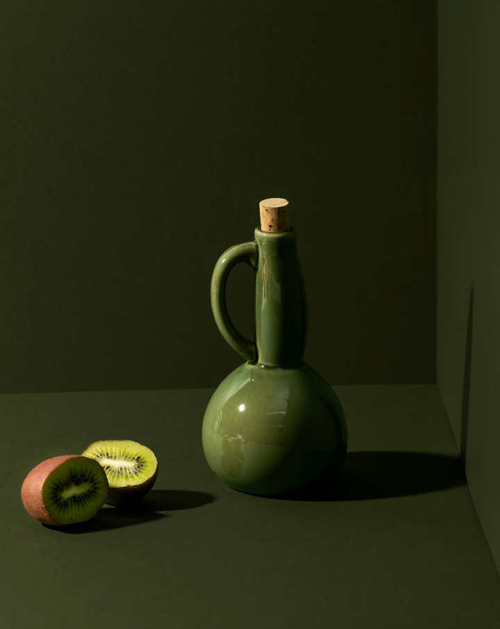 Handmade stoneware olive oil cruet with a narrow pour spout, by Gharyan.