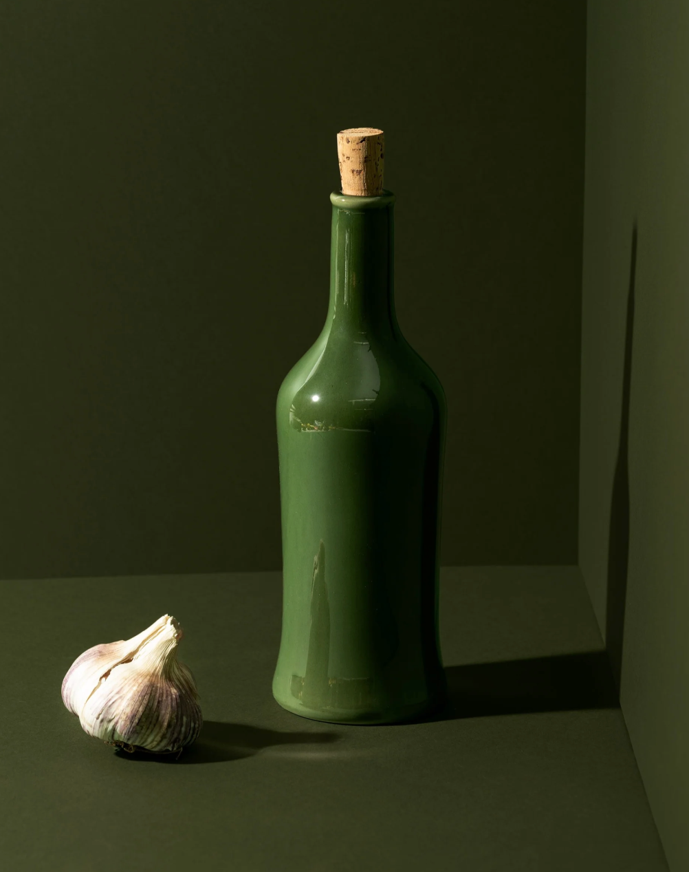 Handmade stoneware olive oil dispenser, 21oz, with a matte glaze and slender pour spout, made in Tunisia.