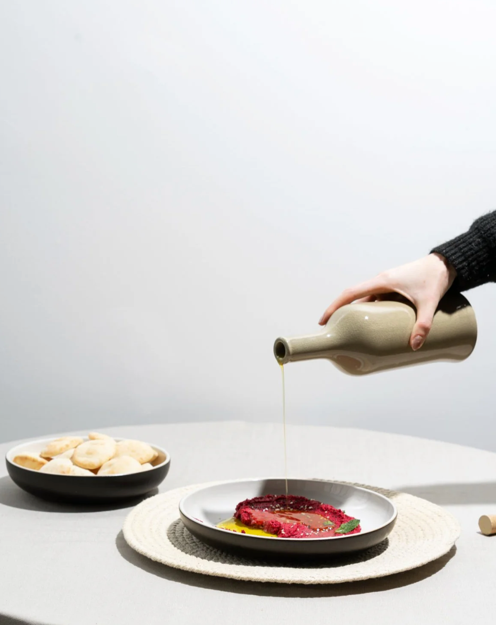 Stoneware olive oil cruet, 21oz, matte-glazed with a narrow spout for oil or vinegar, Tunisian-made.