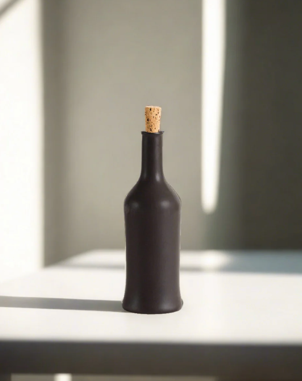 Stoneware olive oil dispenser in a matte finish, 21oz, artisan-made in Tunisia.