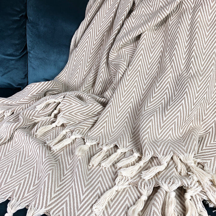 Beige chunky chevron Turkish throw blanket with a textured geometric pattern.