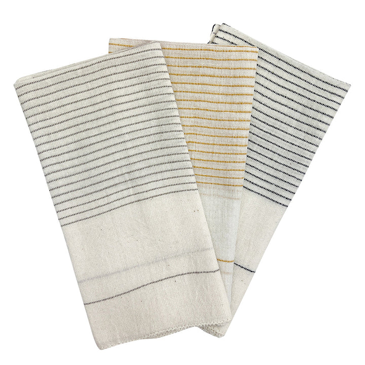 Set of black Hamptons handloom dinner napkins with embroidered details.