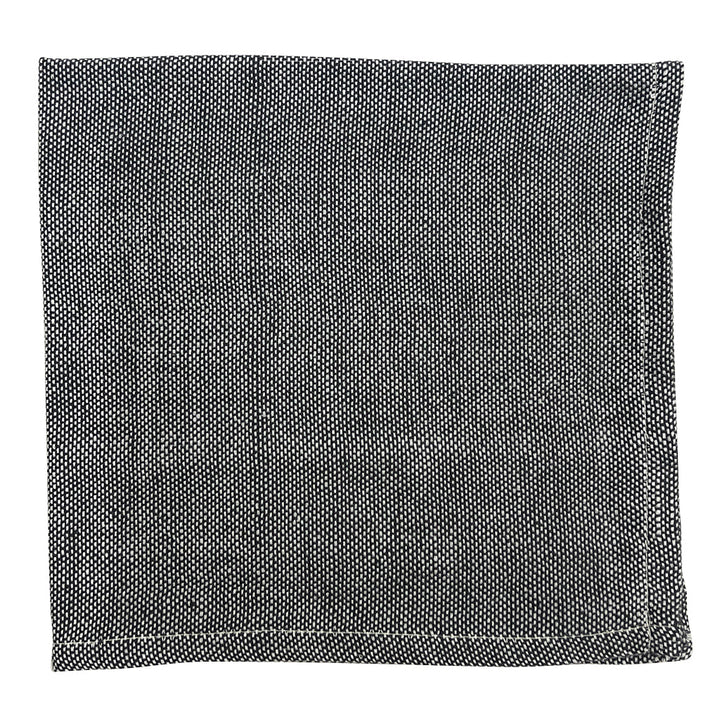 Black handloom dinner napkins in Ethiopian cotton with a textured weave.