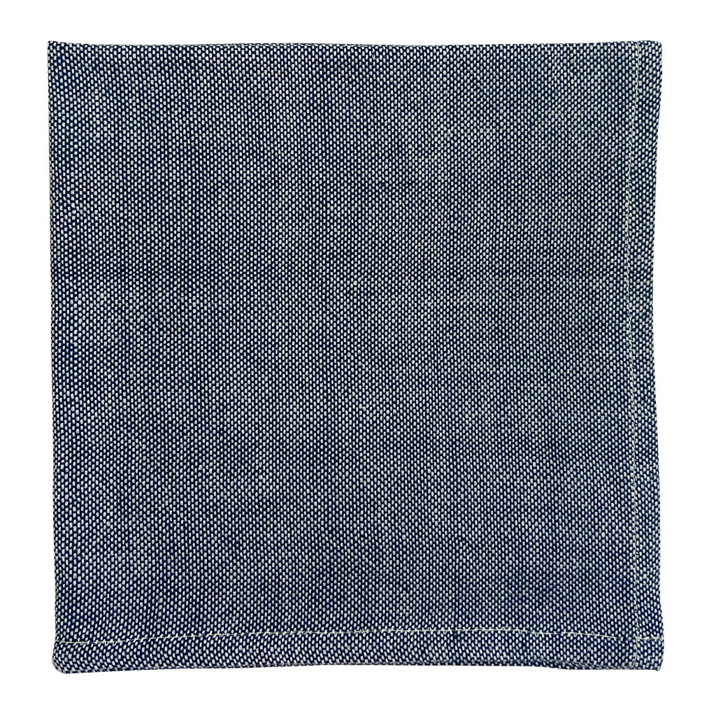 Black handloom dinner napkins in Ethiopian cotton with intricate woven texture.