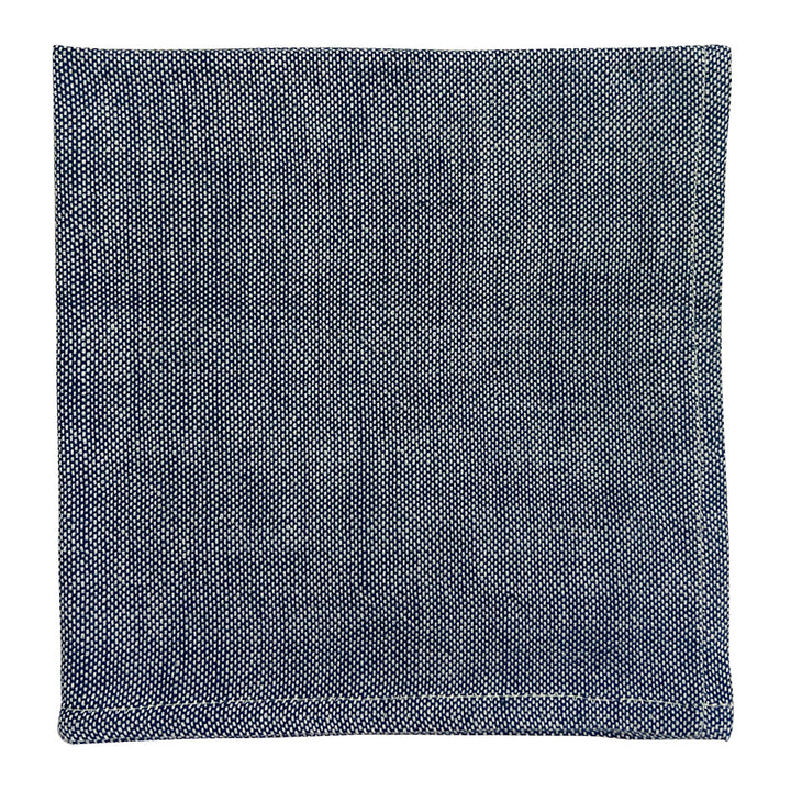 Black handloom dinner napkins in Ethiopian cotton with intricate woven texture.