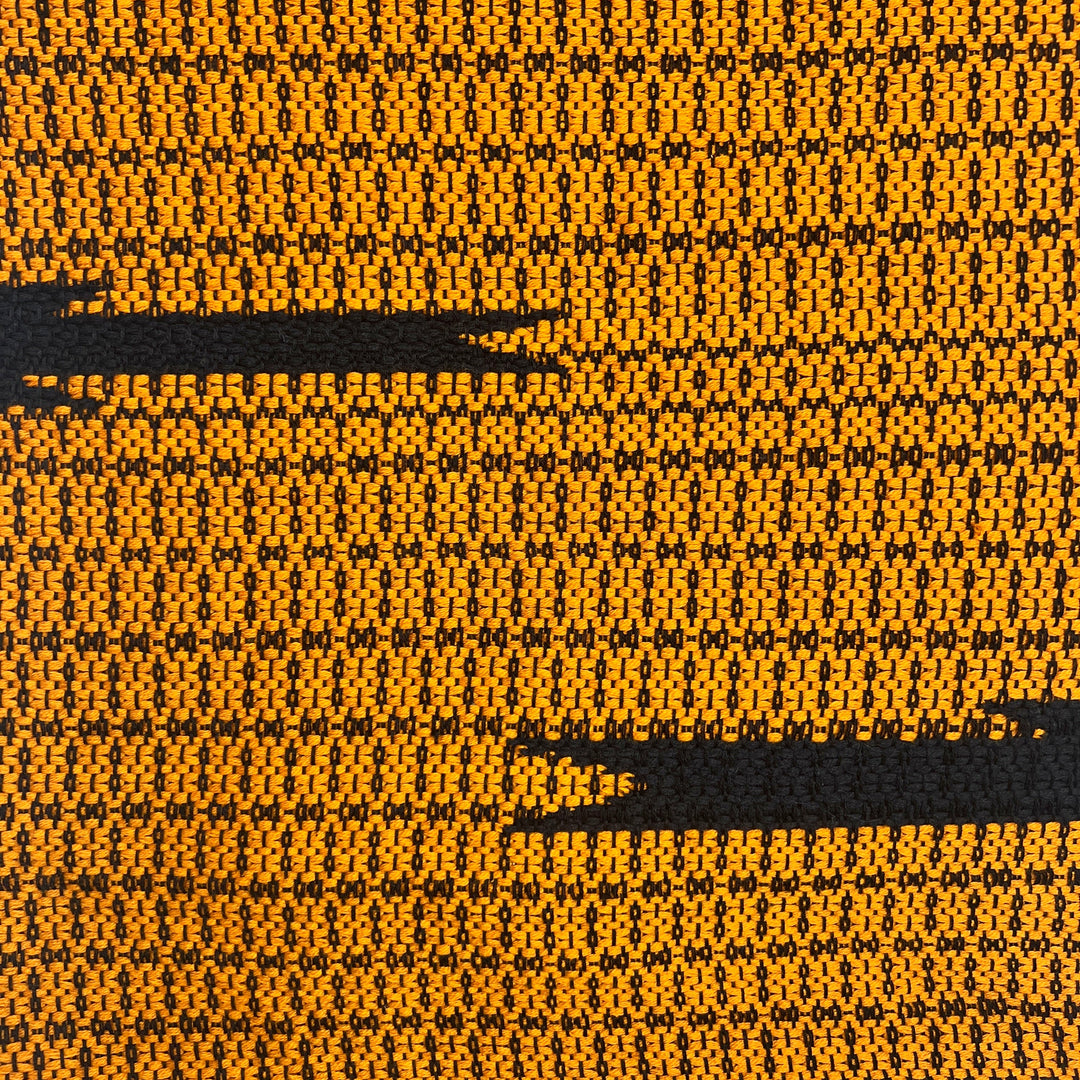 Bronze Cambodian handloom organic cotton throw with traditional woven patterns.