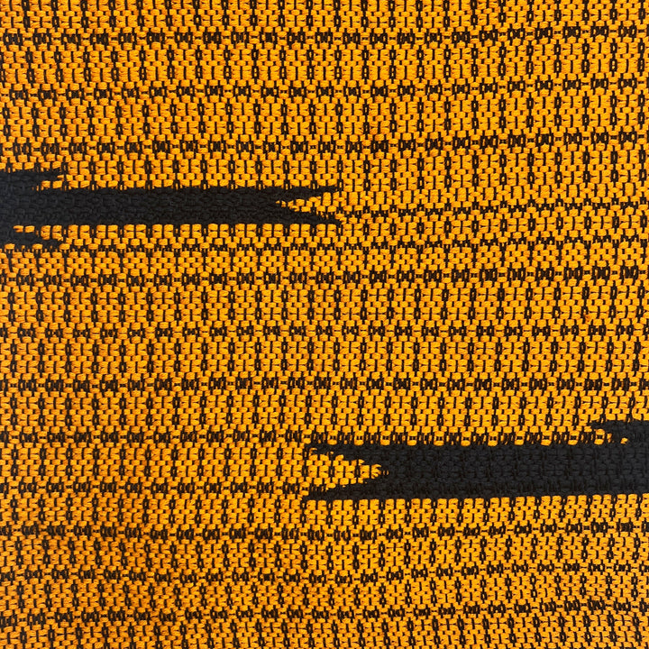 Bronze Cambodian handloom organic cotton throw with traditional woven patterns.