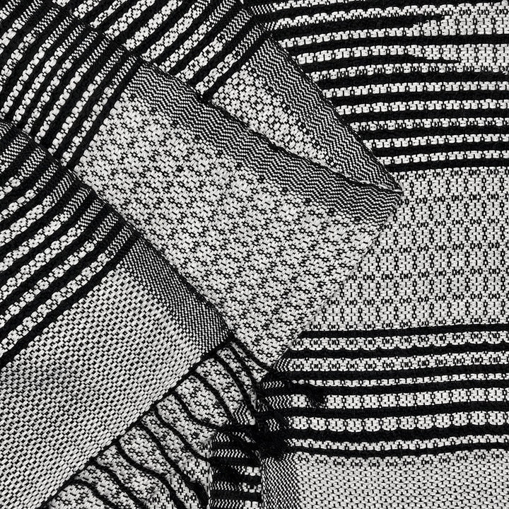 Bronze Cambodian handloom organic cotton throw with intricate woven patterns.