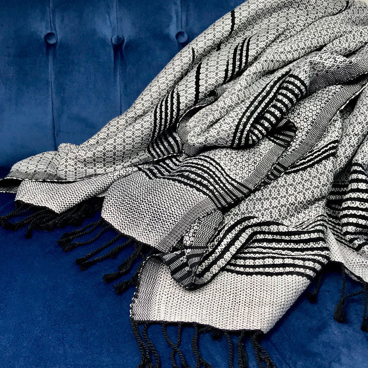 Bronze Cambodian handloom organic cotton throw with woven patterns and texture.