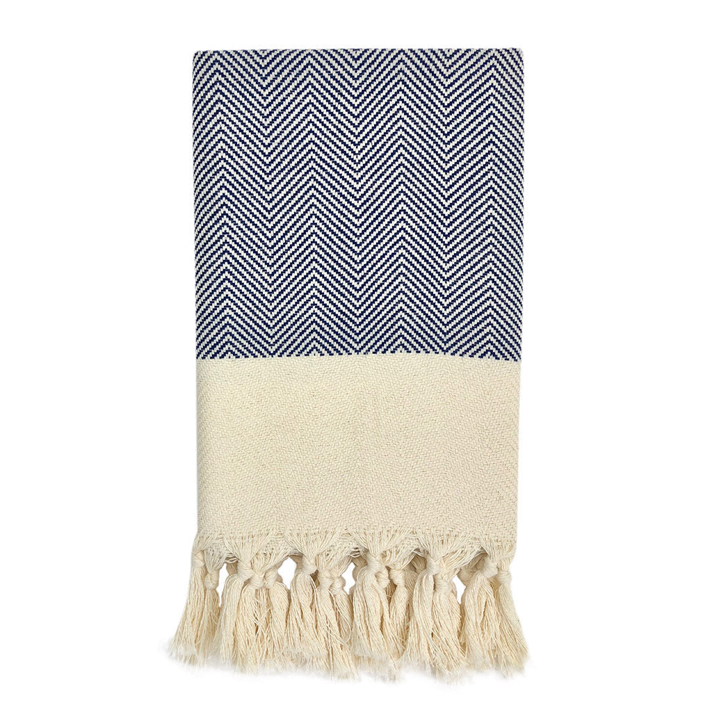 Champagne herringbone Turkish cotton hand towel with a textured pattern.