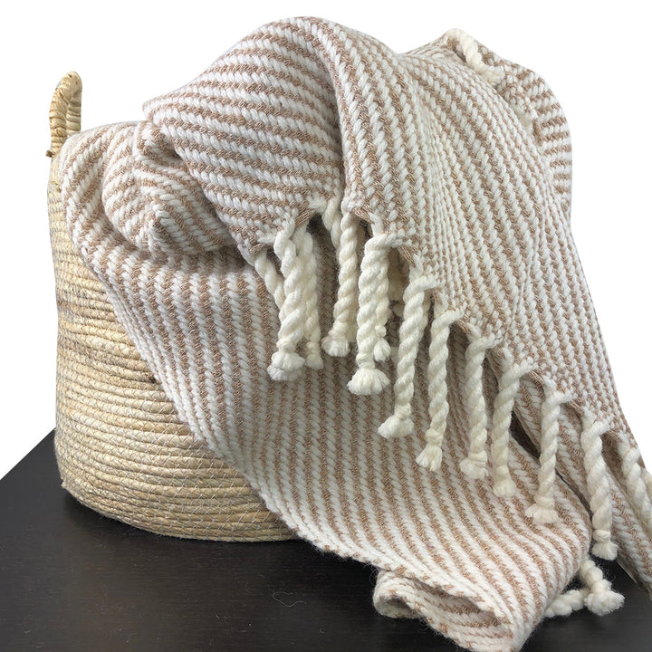 Chunky camel stripe alpaca throw blanket, cozy and soft in warm tones.