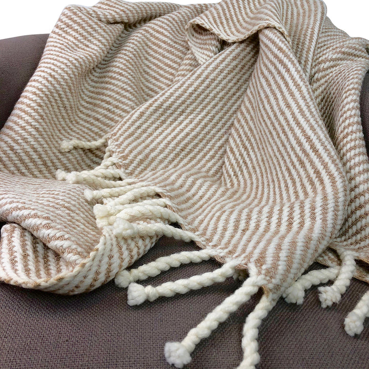 Chunky camel and cream striped alpaca throw blanket, soft and cozy.