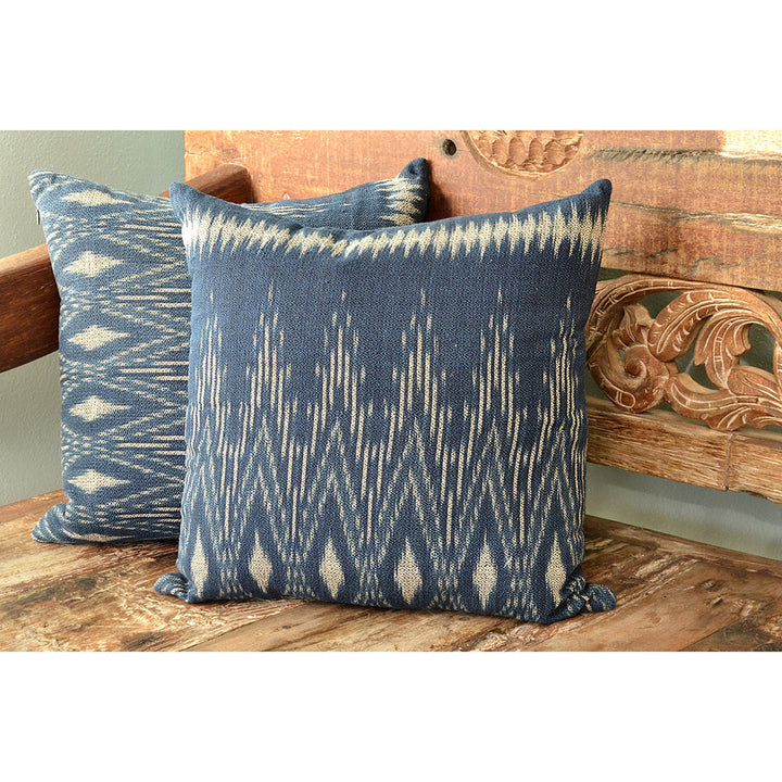 Handwoven indigo ikat pillow cover with a blue and white ikat pattern.