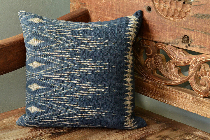 Indigo ikat pillow cover with an intricate handwoven ikat pattern.