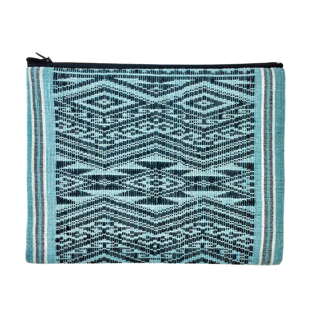 Woven saa-fiber Ocean Tribal clutch with a tribal pattern and compact design.