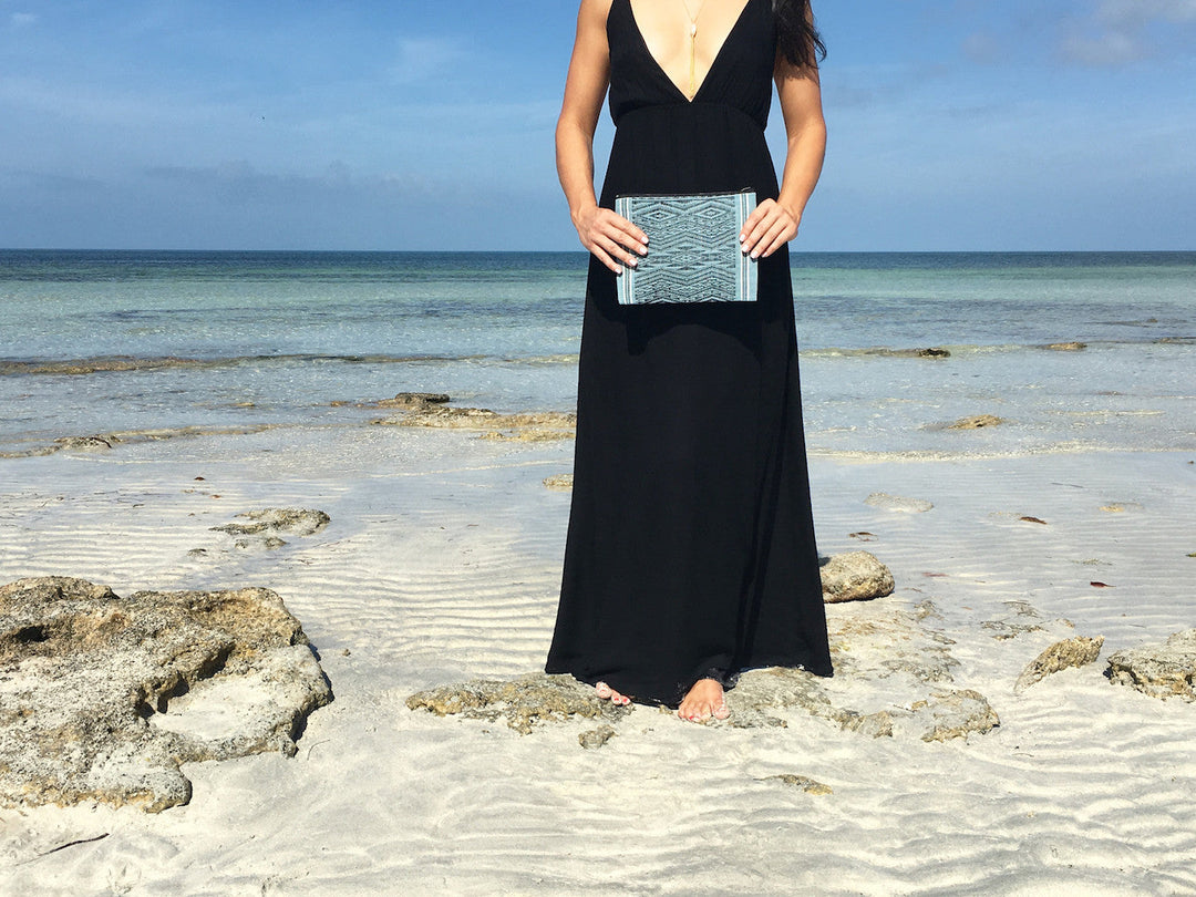 Ocean Tribal clutch with woven design and tribal pattern.