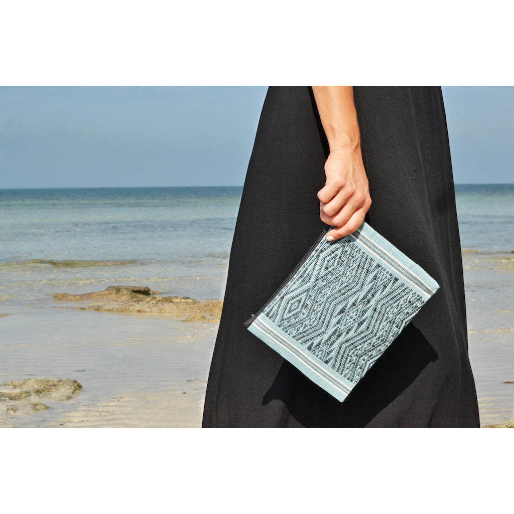 Woven Ocean Tribal clutch with an intricate tribal pattern.
