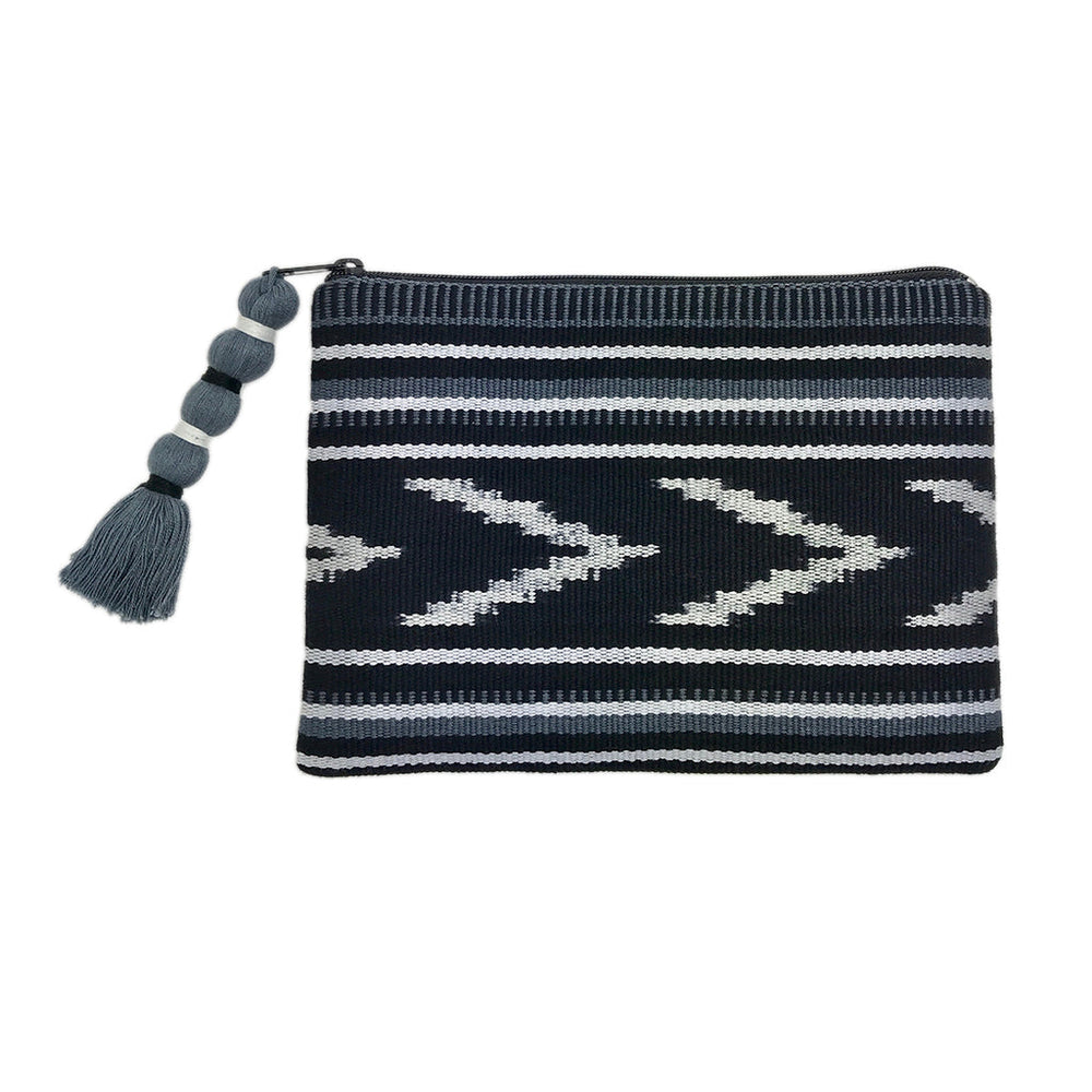 Indigo and tan ikat backstrap clutch with an intricate woven design and strap.