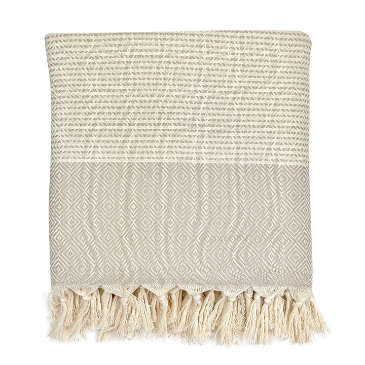 Turkish throw blanket with a diamond stripe pattern in lilac and gray, soft woven fabric.
