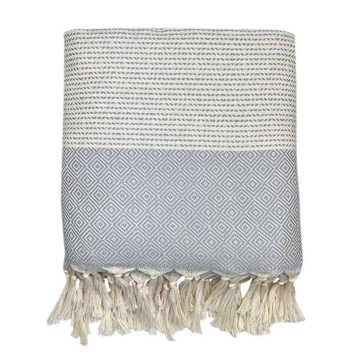 Lilac and gray Turkish throw blanket with a diamond stripe pattern.