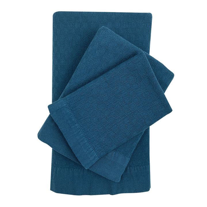 Set of 3 Turkish towels (bath, hand, washcloth) in natural oat color.