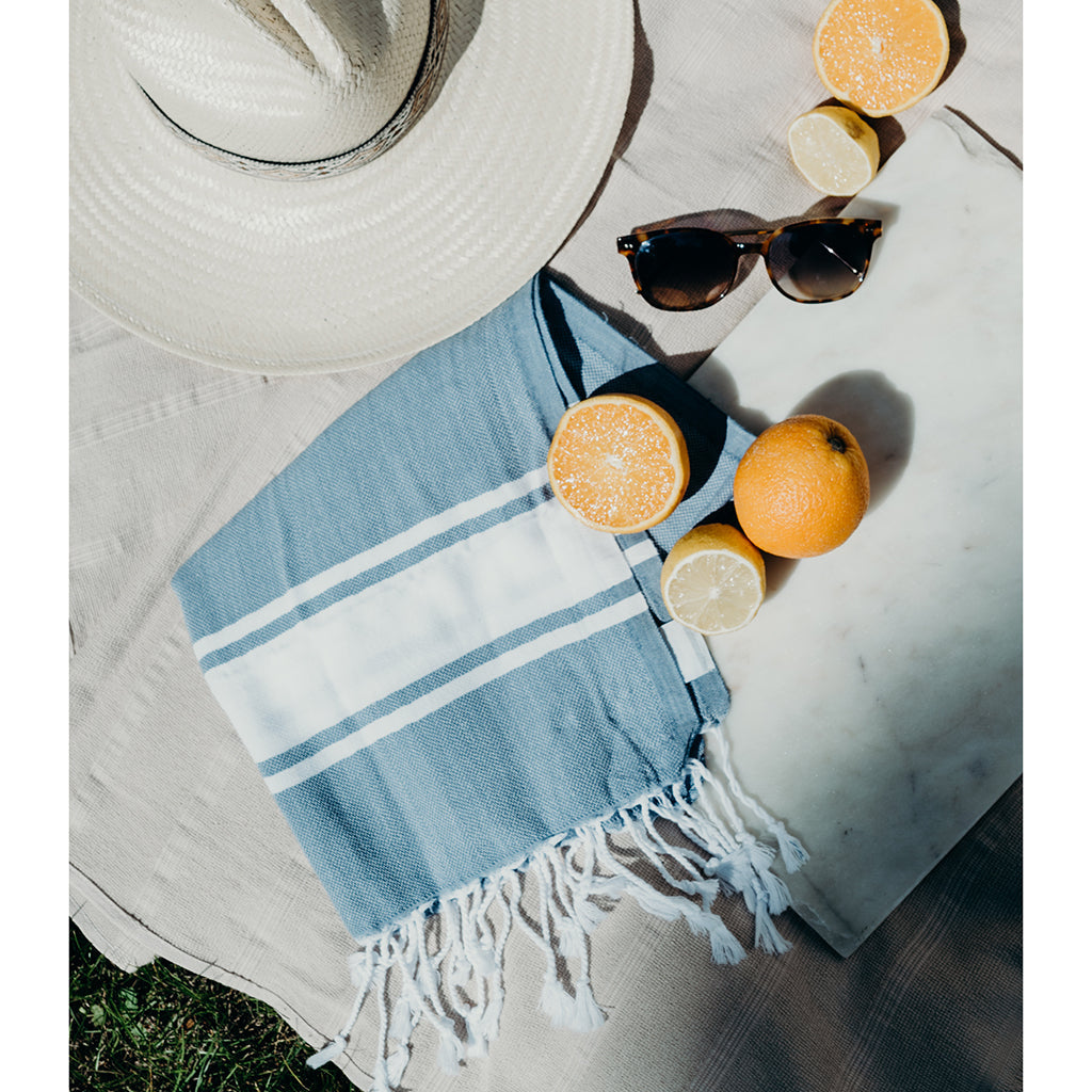 Steel gray Turkish hand towel with a stripe pattern and soft, textured cotton.