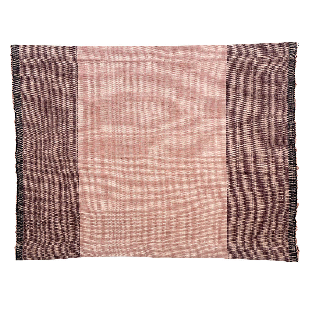 Handwoven cotton color block placemat set in natural stone tones.