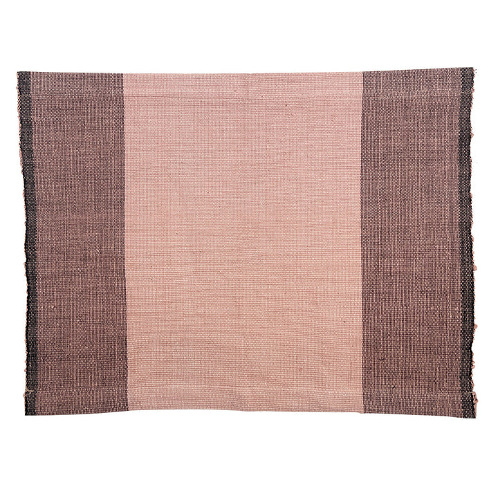 Handwoven cotton color block placemat set in natural stone tones.