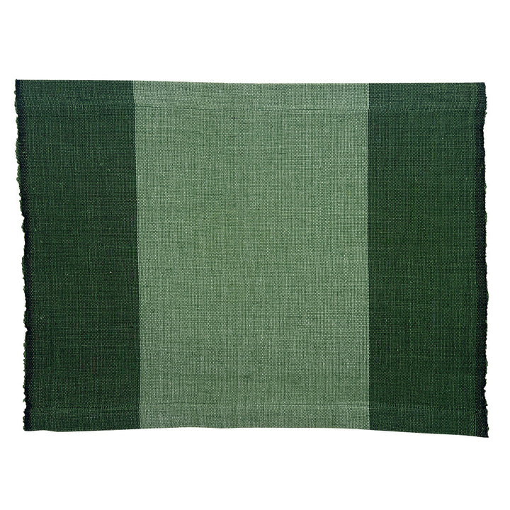 Handwoven cotton color block placemat set in neutral tones for a dining table.