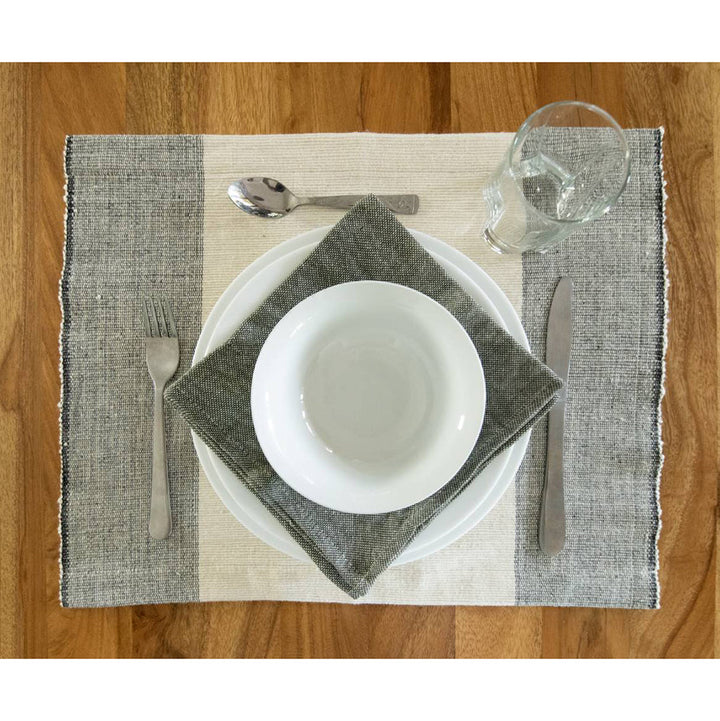 Handwoven cotton color block placemat set in stone and neutral tones for dining decor.