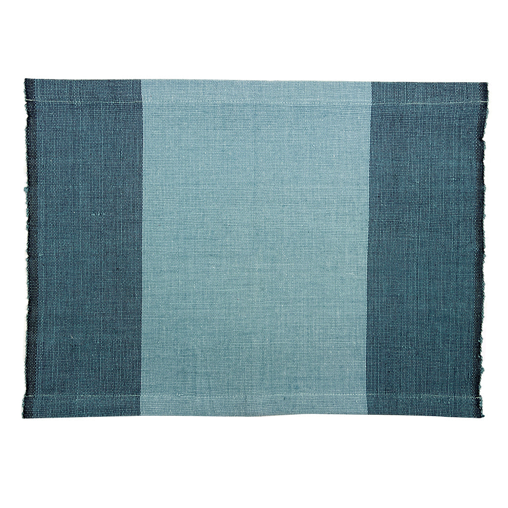 Handwoven cotton color block placemat set with stone and vibrant color blocks.